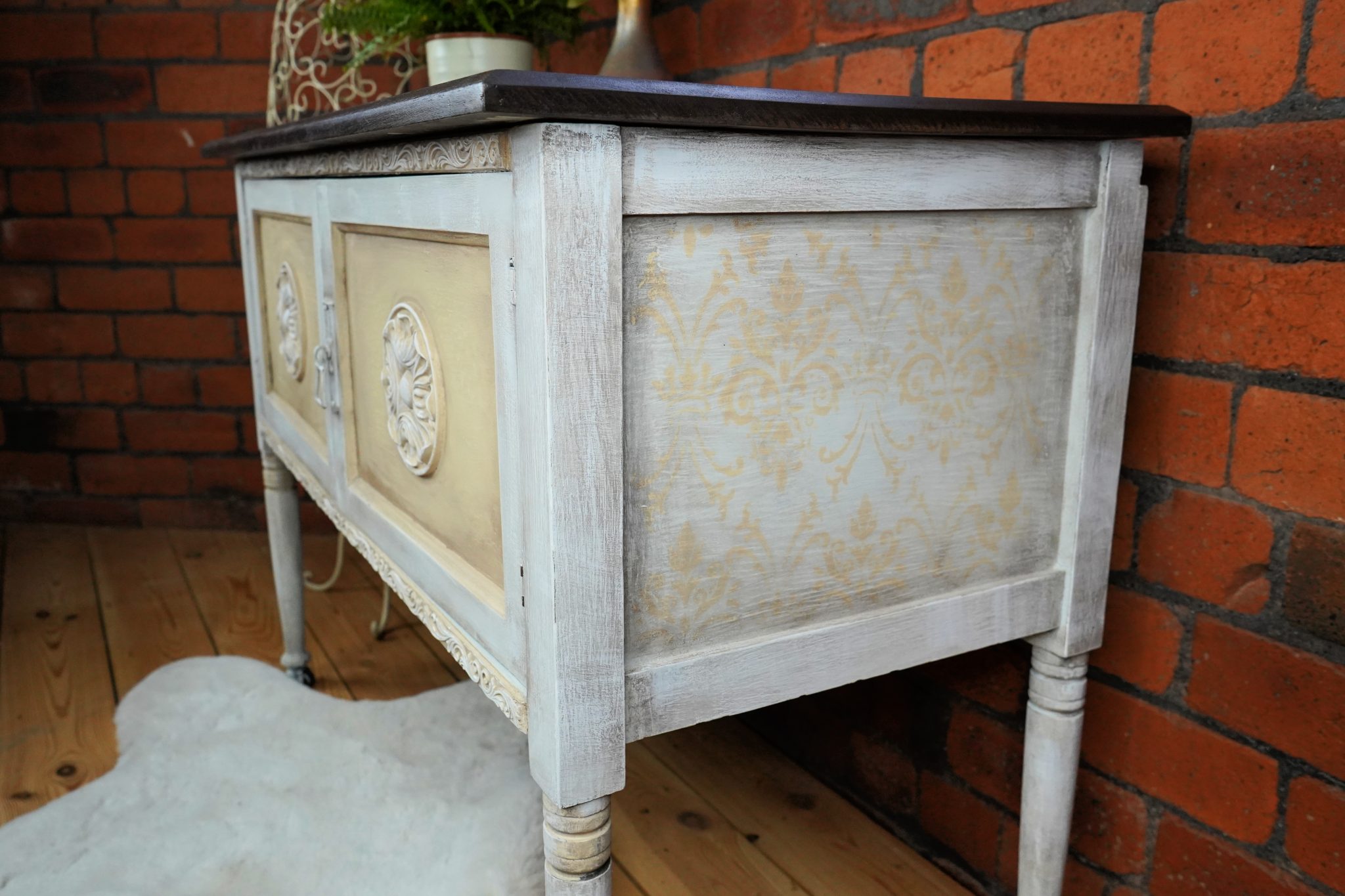 Shabby Chic Blanket Box painted with White wash and a royal damask stencil on side in a very pale yellow chalk paint.
