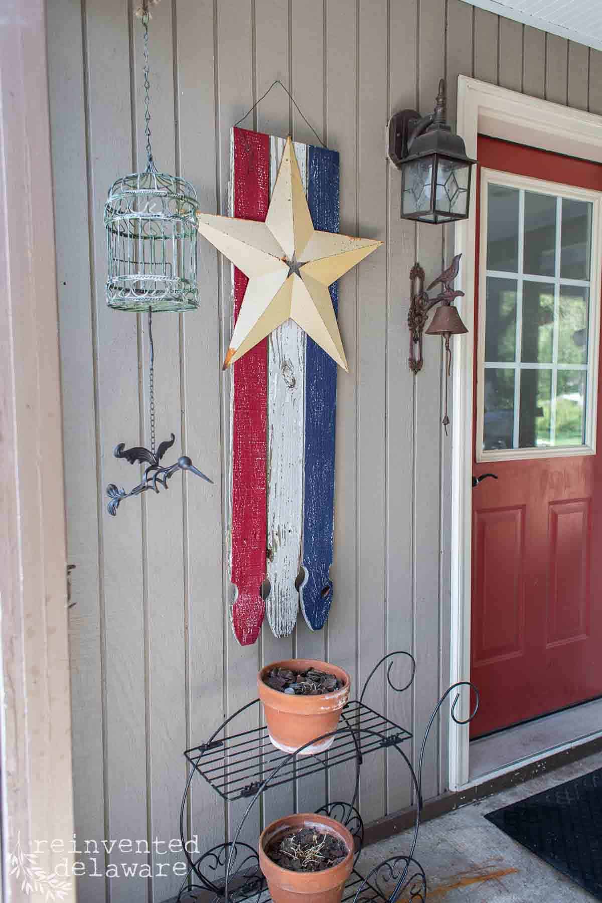 DIY American flag hung on front/side of house.