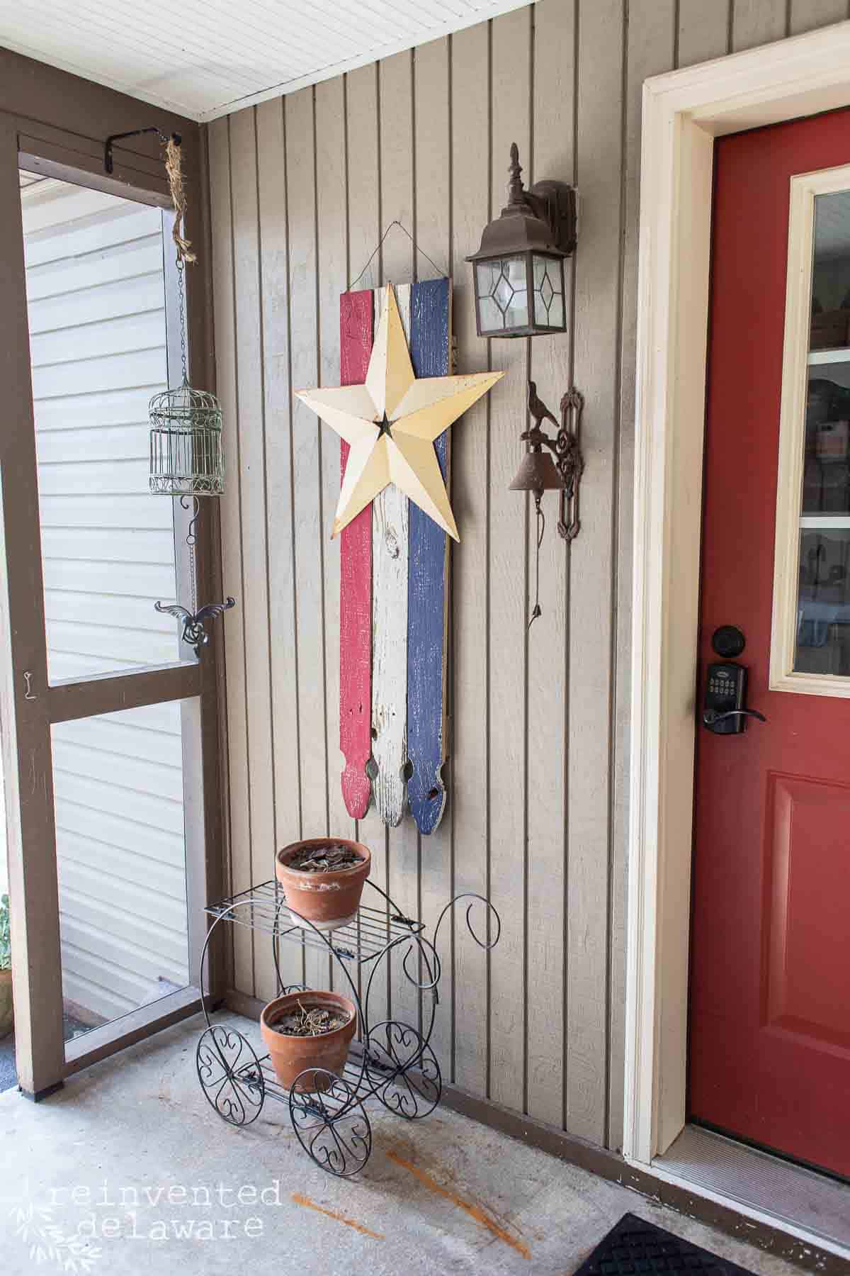 Completed DIY American flag hung on front/side of house.