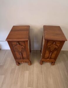 "Before" picture of brown wooden vanity missing the center section sitting on brown wooden floor in front of a white painted wall.